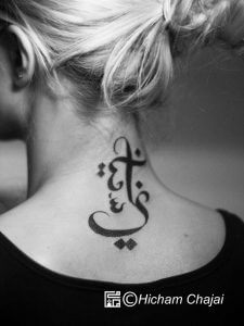 Arabian neck tattoo