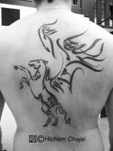 calligraphie arabe horse tattoo